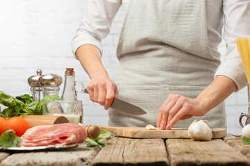 Chef Prepares Slicing Garlic Bright Kitchen Ingredients Background Recipe Book