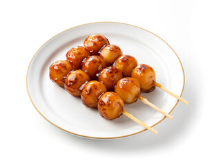 Mitarashi dango placed on a white background