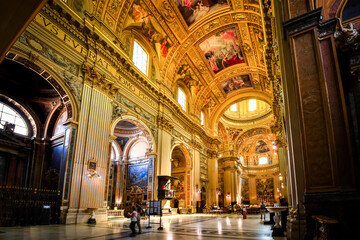 Fototapeta na wymiar The ornate, baroque interior of the Basilica of Sant'Andrea della Valle in the historic center of Rome, Italy