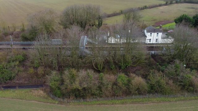 Drone footage showing Adisham train station in Kent, England. A scenic train station.