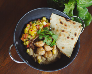 squid with hummus and mango salsa