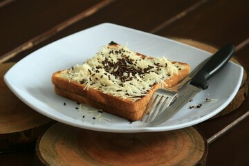 delicious bread sprinkled with messes and cheese 
