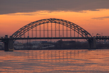 Fototapeta na wymiar city harbour bridge at sunset