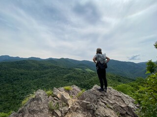 Fototapeta premium woman on top of mountain