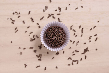 Sweet brigadeiro on the table with sprinkles