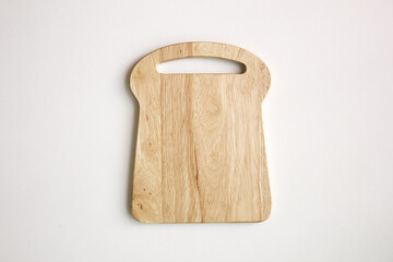 Mini wooden chopping board isolated white background