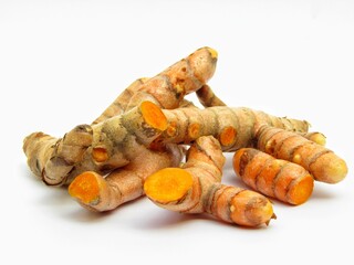 Turmeric roots isolated on white background