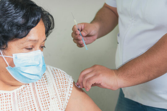 Sample Of Vaccine Application To An Older Person