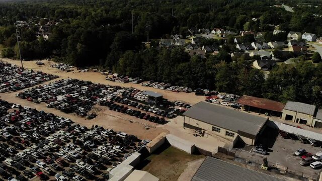 Aerial view of a huge junkyard with old and abandoned cars