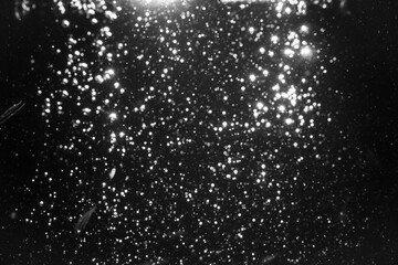 Beautiful white bokeh of light with black background