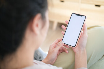 Close up view of business holding mobile phone with blank screen.	