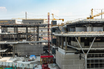 Construction site background. Crane and building under construction
