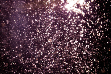 Pink glitter bokeh vintage lights with  black background