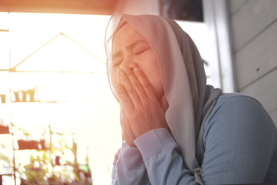 Sad muslim woman contemplating something