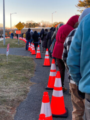Line of people waiting for vaccination covid treatment at immunization center