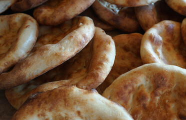Hot bread baked on the fire in the oven