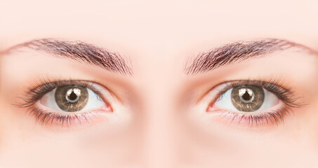 Obraz premium Close-up beautiful girl with tan color eye 