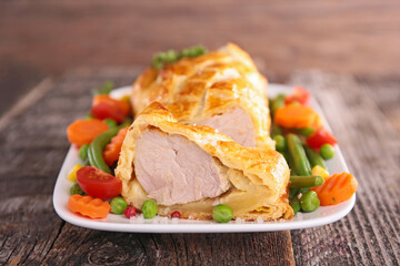 meat and dough slices with vegetables