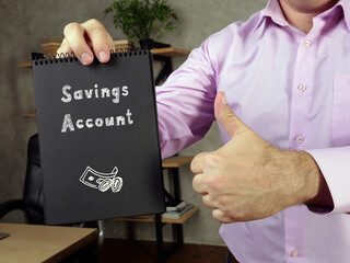 Business concept meaning Savings Account r with sign on the page.
