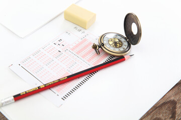Answer cards, pencils and pocket watches for college entrance examination