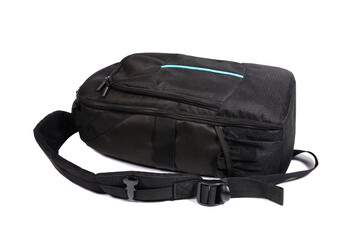 Naklejka premium black photo backpack, travel and hiking concept. isolated on white background.