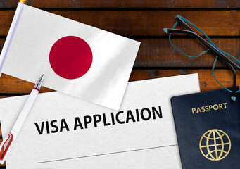 Flag of Japan, visa application form and passport on table
