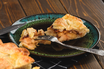 apple pie on a wooden background. Rustic style.