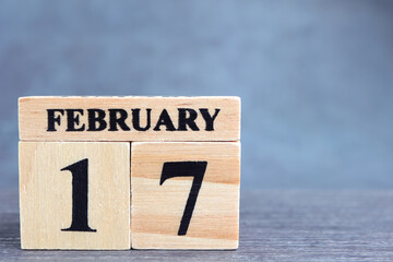 Day 17 of february month, Wooden calendar with date. Empty space for text.