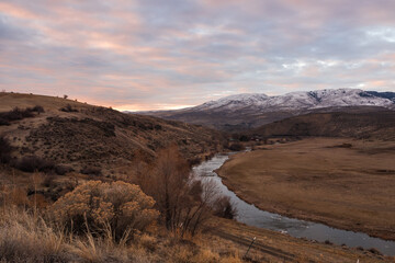 Colorful sky colors during sunrise over the Powder river valley in Hells Canyon area Oregon