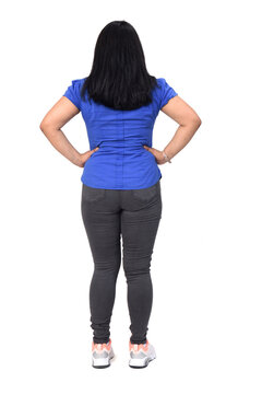 Full Portrait Of A Woman From Behind With Hands On Hip On White Background