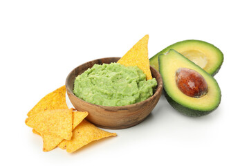 Bowl of guacamole, avocado and chips isolated on white background