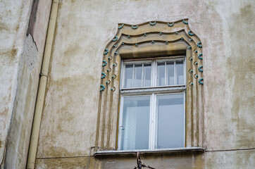 Windows with decorative baroque facades in the center of Timisoara, Romania 