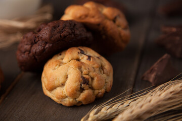 Cookies on a wooden table with wheat ear