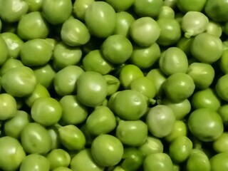 Green peas are cleaned. Background of peas