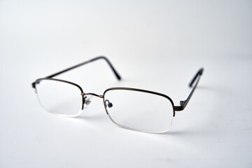 Reading glasses on white