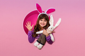 Obraz na płótnie Canvas Cute kid with bunny ears on Easter day