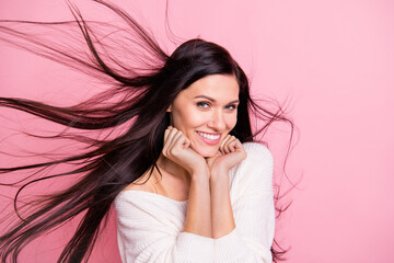 Portrait of young beautiful pretty cute smiling cheerful good mood girl with flying hair isolated...