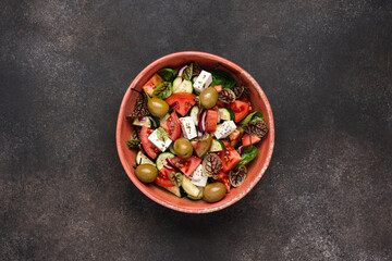 Traditional Greek salad with feta cheese. Bright and juicy vegetable healthy snack