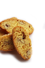 Traditional Italian Cantucci or Cantuccini cookies with almonds isolated on white background