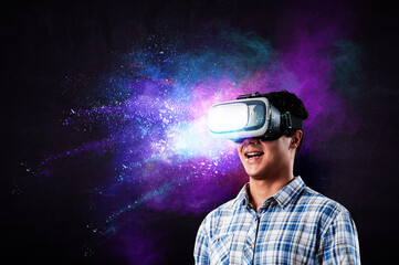 Obraz na płótnie Canvas man wearing virtual reality goggles