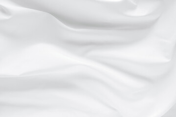 Obraz premium Abstract white fabric texture background. Cloth soft wave. Creases of satin. silk and cotton.