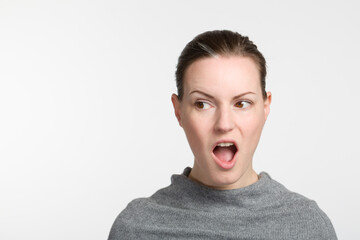 surprised looking woman with open mouth