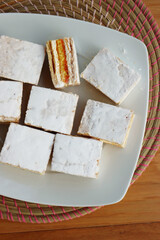 Italian traditional Diplomat or Diplomatic pastries on a plate on wooden table 