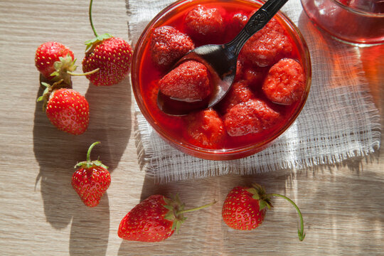 Homemade strawberry jam and fresh strawberries. Rustic style.Selective focus