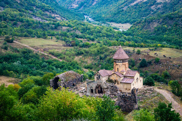 Fototapeta na wymiar Dzoragyugh, Armenia - September 17, 2020: Hnevank monastery, a 7th-12th century Armenian Apostolic Church monastery in Dzoraget canyon, Armenia