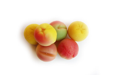 Traditional Italian Marzipan fruits isolated on white background. Sweet Marzipan shaped like fruits from Sicily