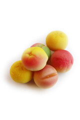 Traditional Italian Marzipan fruits isolated on white background. Sweet Marzipan shaped like fruits from Sicily