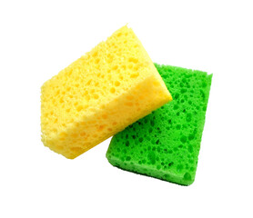 Green and yellow rectangular porous washing sponges isolated on a white background