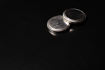 Round batteries for TV remote controls and watches. For computers. Round and silver.