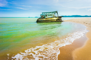 Fishing boat founder on the beach